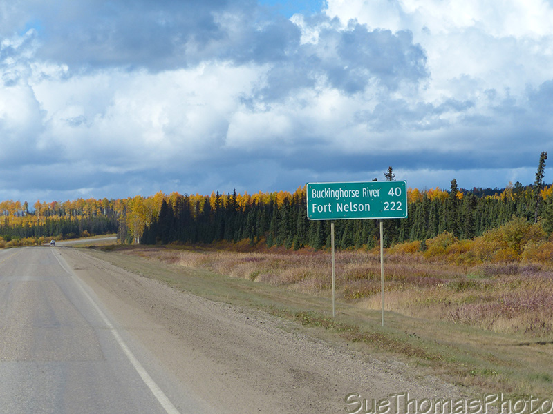 Distance sign to Fort Nelson